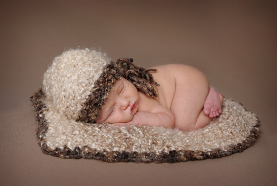 Newborn baby portrait session in both natural light and studio light